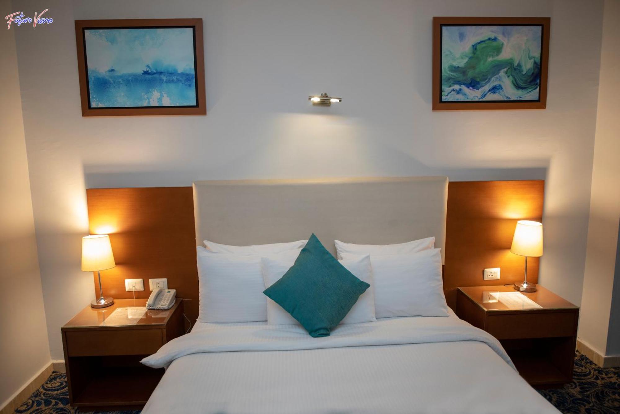 Rehana Plaza Hotel Cairo Exterior foto A bedroom at the hotel