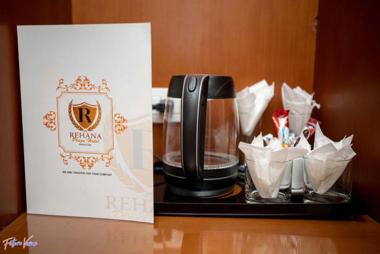 Rehana Plaza Hotel Cairo Exterior foto A tea and coffee making facility in a hotel room
