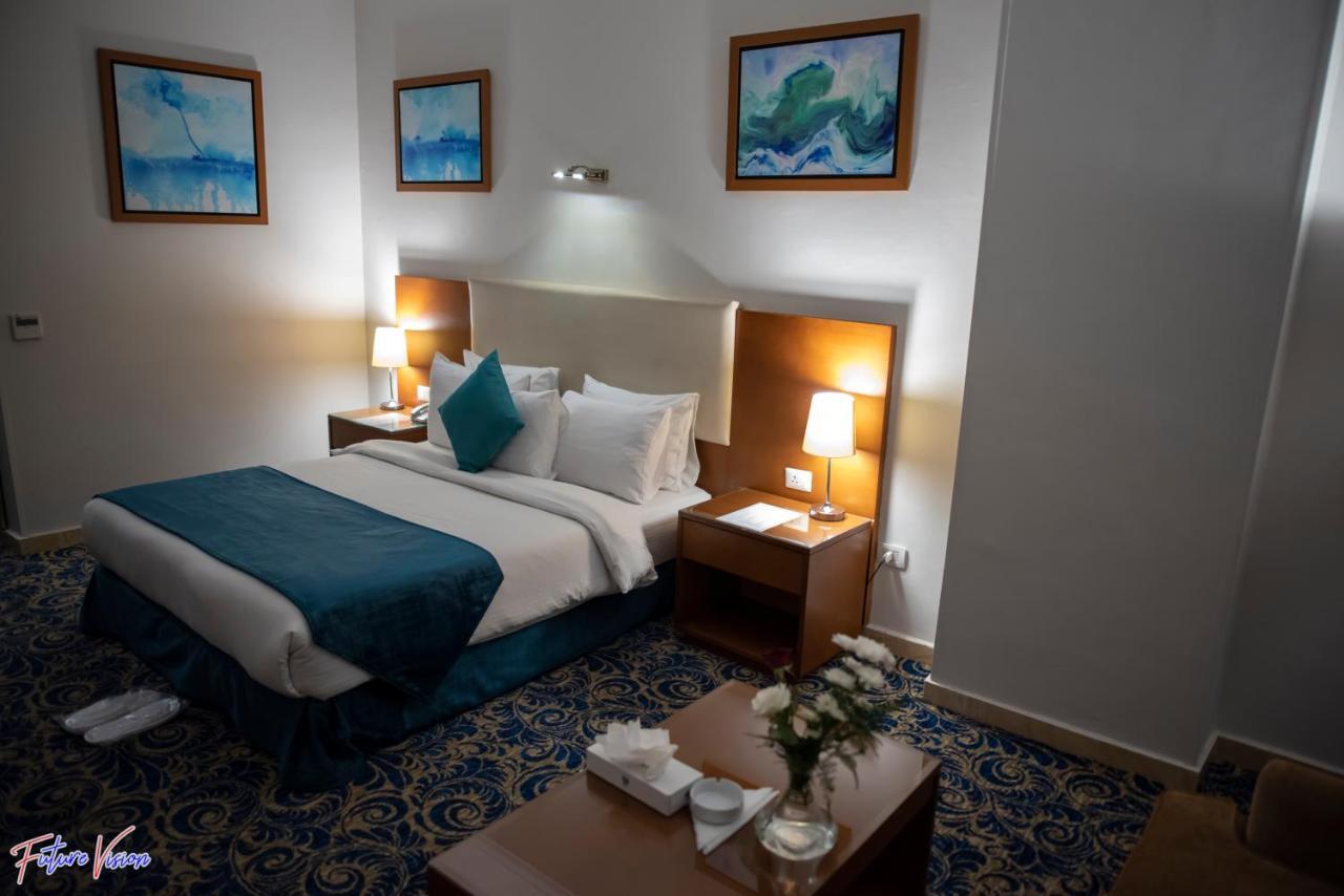 Rehana Plaza Hotel Cairo Exterior foto A room at the hotel